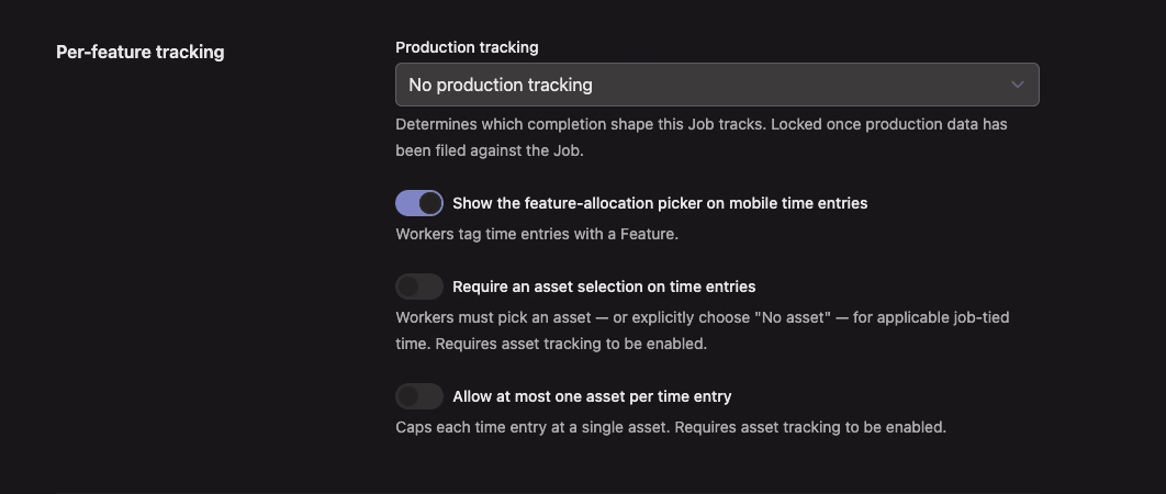 The Per-feature tracking section of the job form with toggles to require an asset selection and to allow at most one asset per time entry